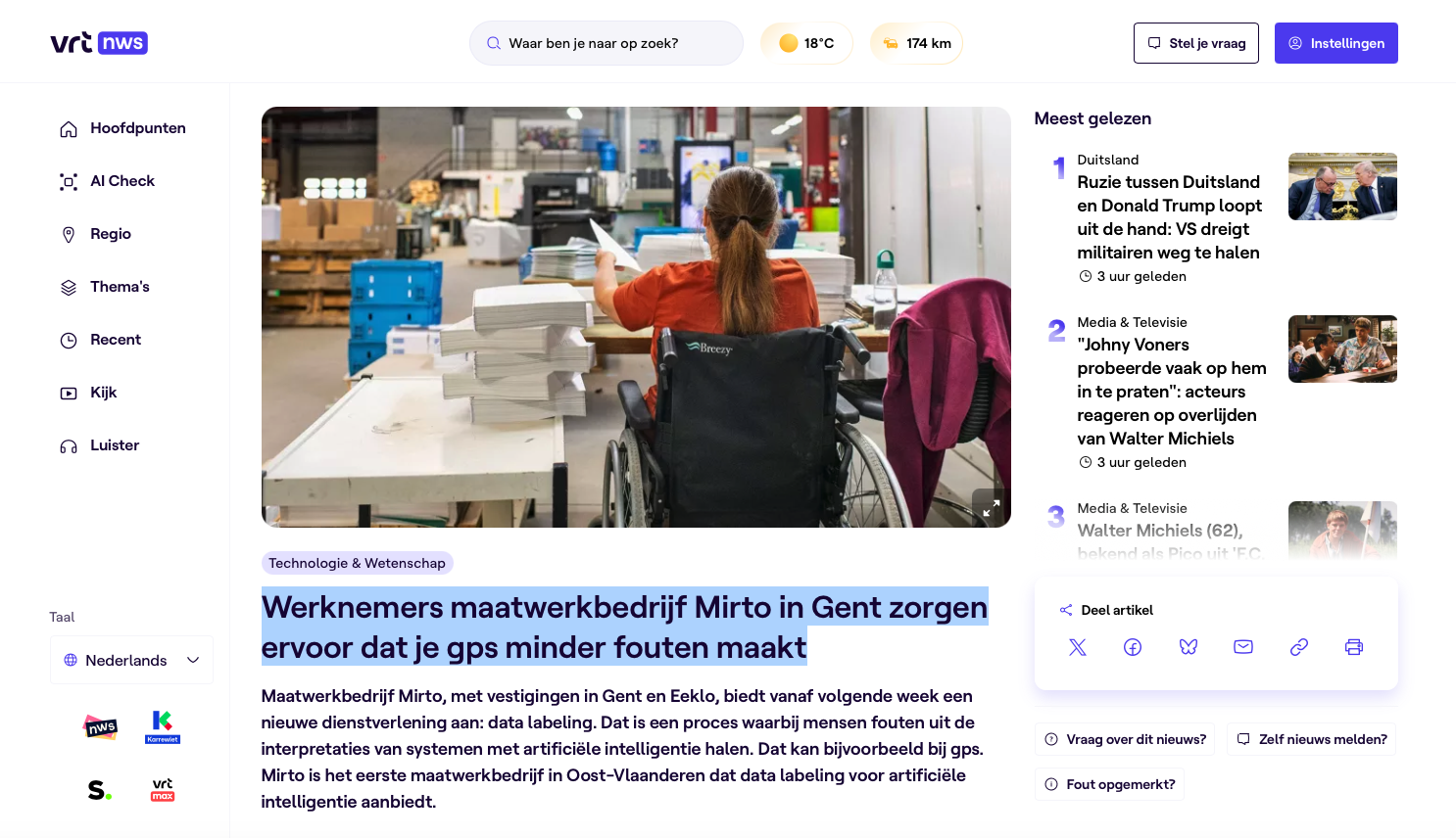 Back view of a person in a wheelchair at a desk in a busy warehouse with stacks of papers and boxes nearby (article header image).